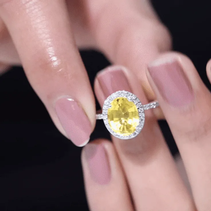 Oval Cut Created Yellow Sapphire and Diamond Classic Halo Ring